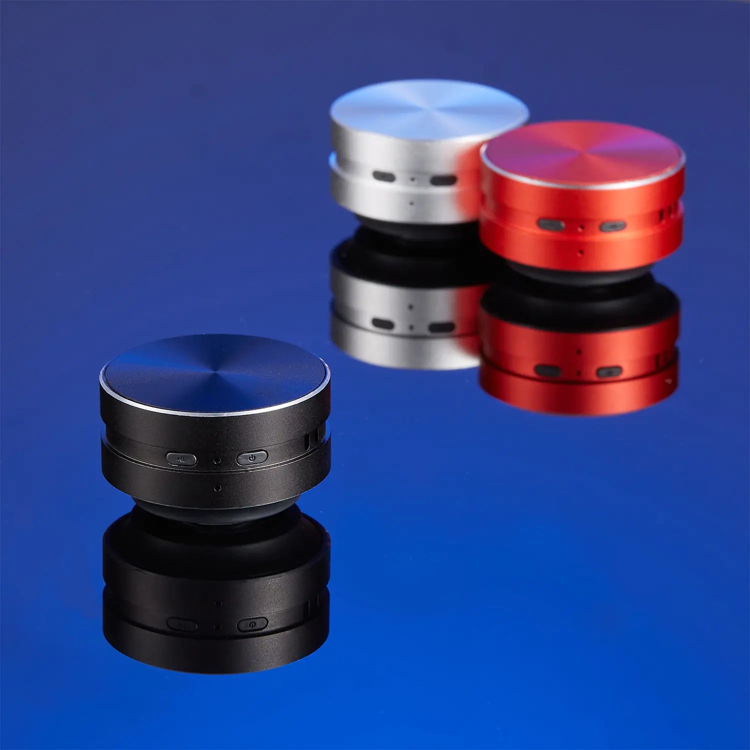 Black white and red Bone Conduction Bluetooth Speaker. side view on blue background